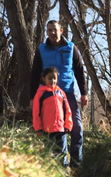 father daughter outside in woods