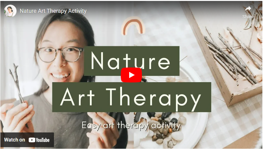 youtube art, woman holding natural wood items